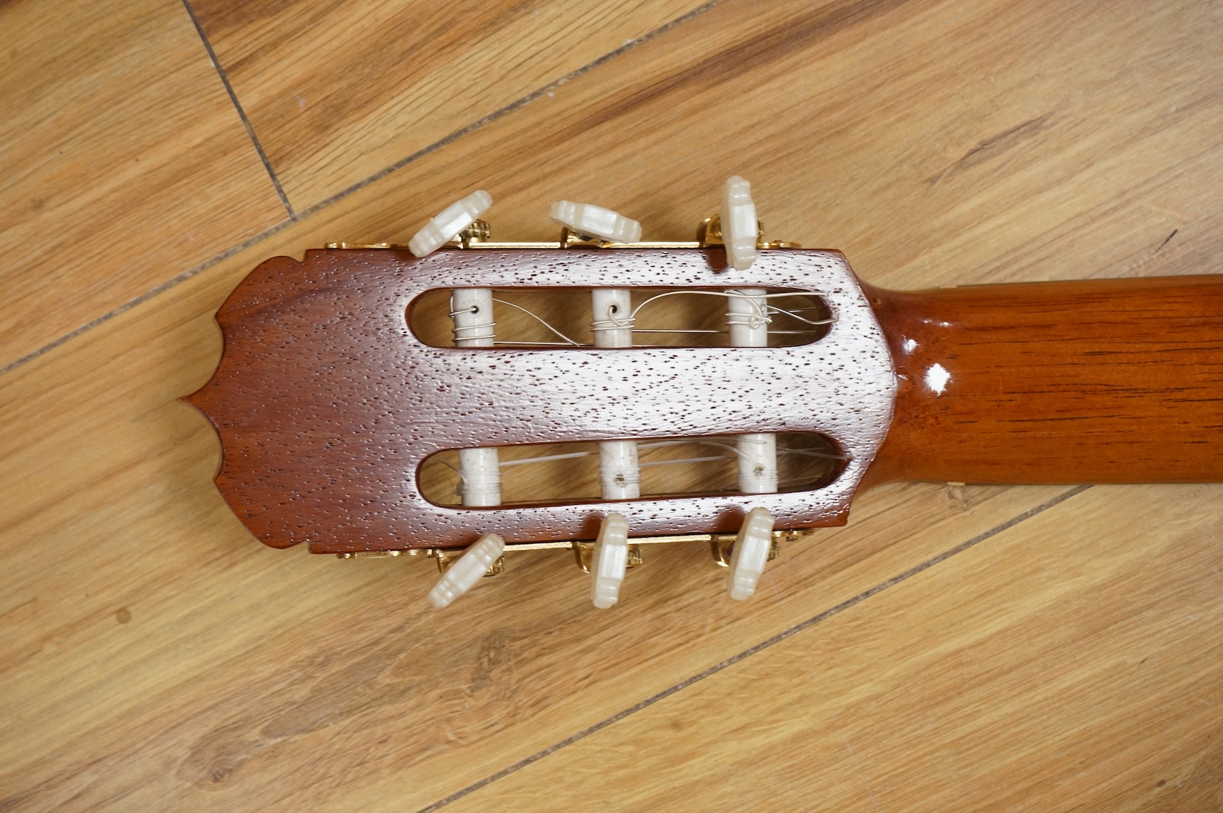 A Ricardo Quiles classical guitar, a Ramirez copy, with spruce top, Indian rosewood back and sides and ebony fingerboard.